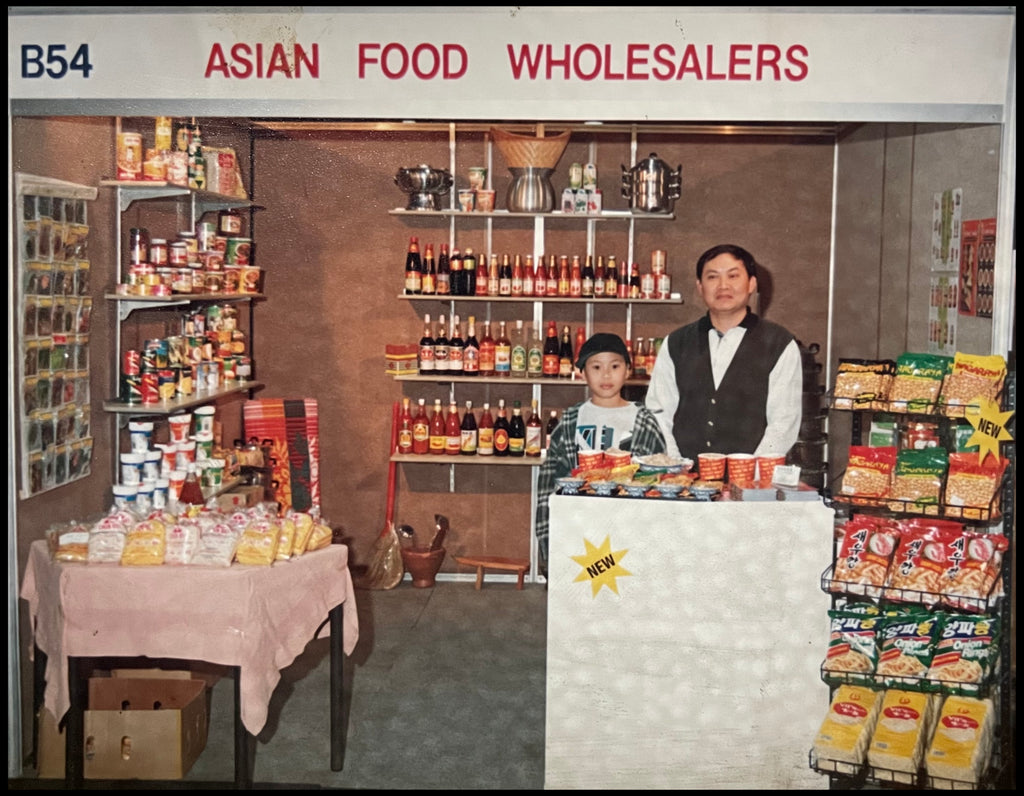 The owner of Asian Food Wholesalers, Kith Lim, and his son, Phillip Wu, attending their first food and drinks expo.